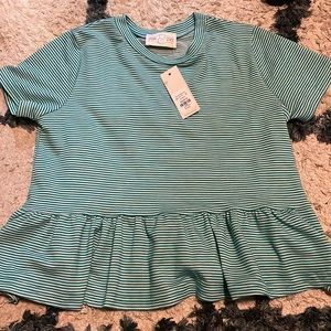 Francesca’s green and white striped shirt